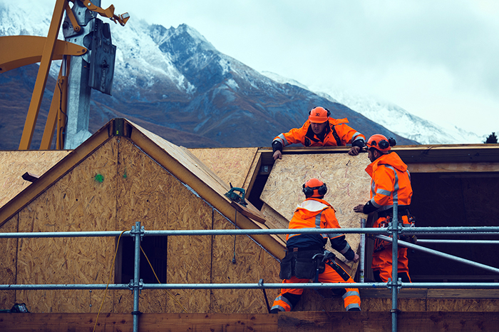 1-builders-slide-panels-into-place-high-res-1